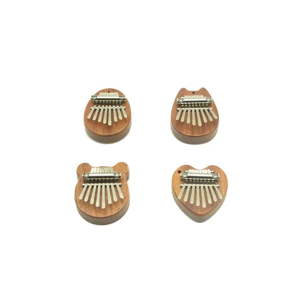 8 Keys Thumb Portable Piano