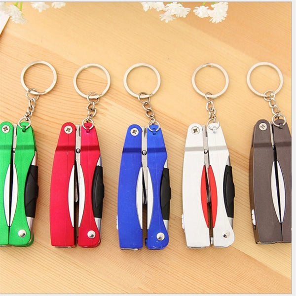Multifunction pen with scissors and LED flashlight