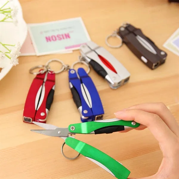 Multifunction pen with scissors and LED flashlight
