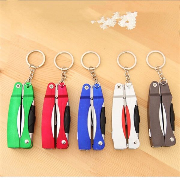 Multifunction pen with scissors and LED flashlight