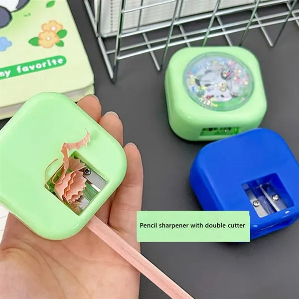 Double-blade pencil sharpener with Quicksand toy