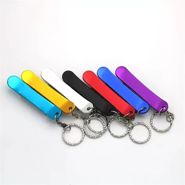 Bottle opener keychain with a skateboard design