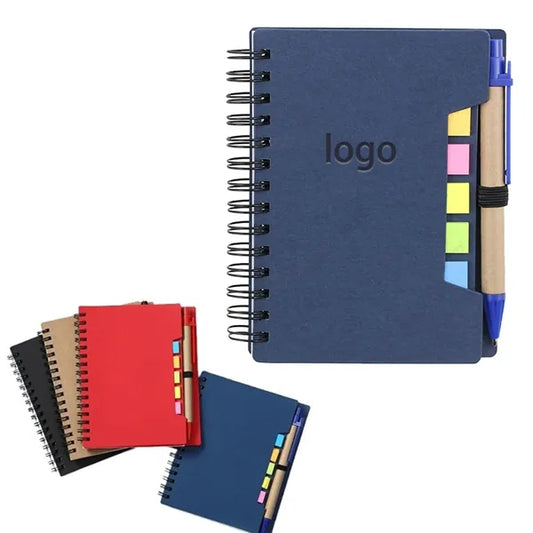 Brown paper notebook with pen and post-it notes