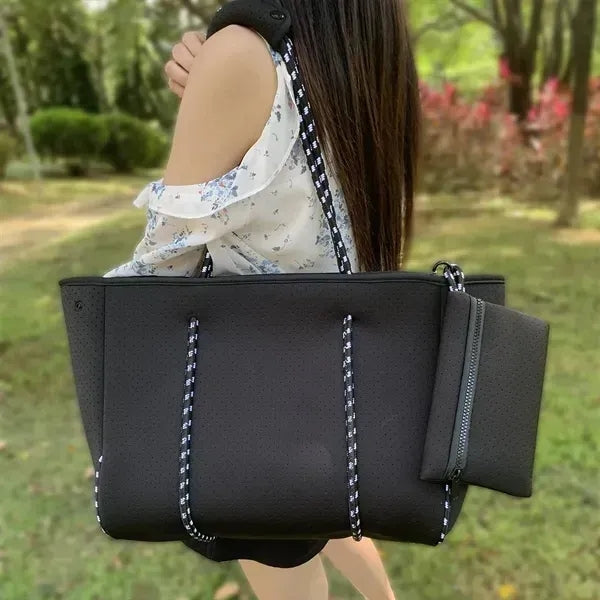 Spacious perforated neoprene tote bag for travel