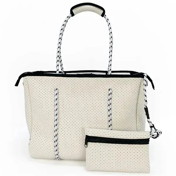 Spacious perforated neoprene tote bag for travel