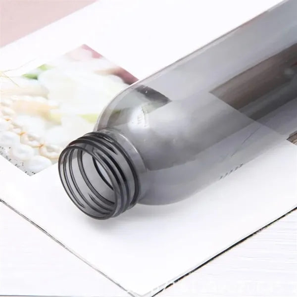 22Oz. Translucent Sports Water Bottle with Carry Loop Cap