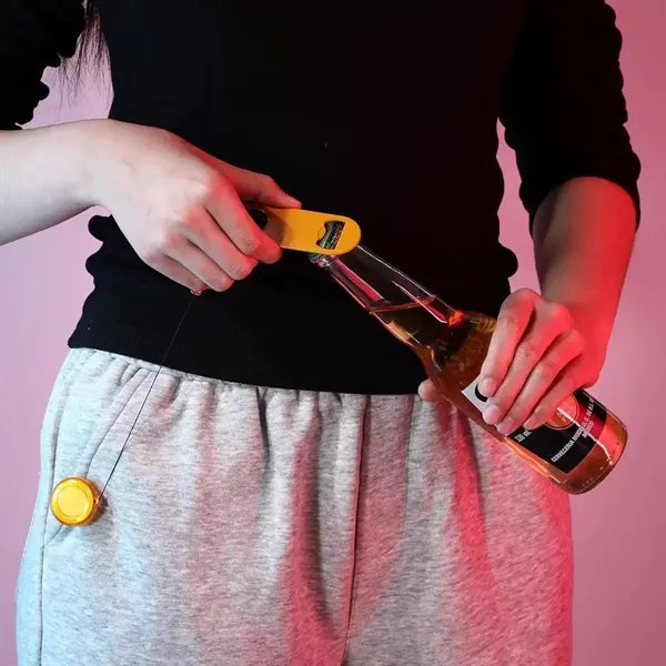 Retractable beer bottle opener