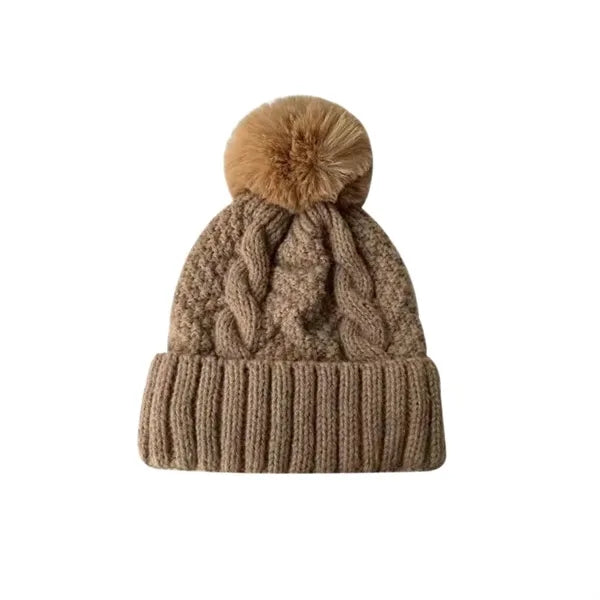 A Versatile Knitted Woolen Cap With Big Wool Balls