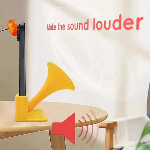 Phone stand with speaker