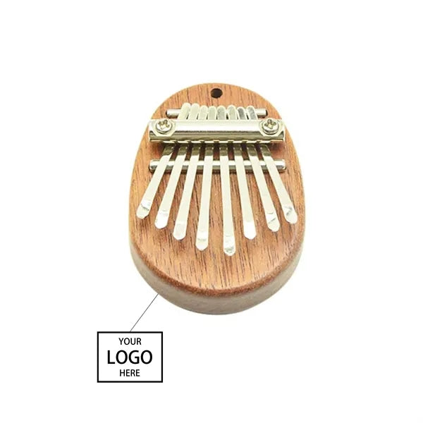 8 Keys Thumb Portable Piano