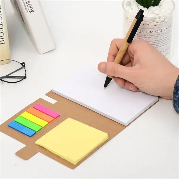 Notebook with pen and sticky notes