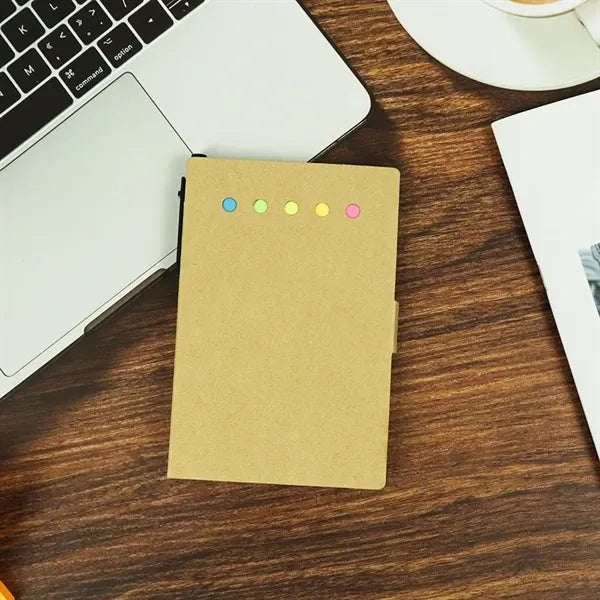 Notebook with pen and sticky notes