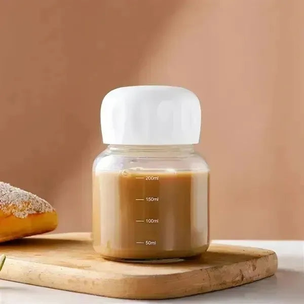 Small Borosilicate Glass Juice Bottle with Lid