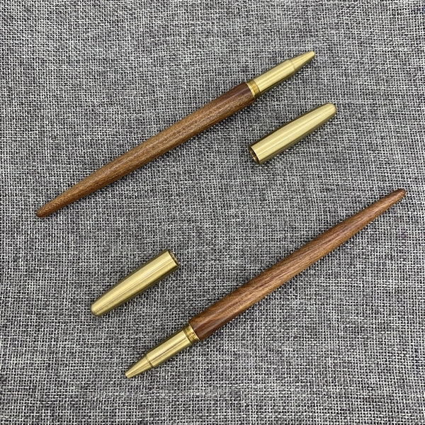 Wooden roller pen with brass screw cap and sharp end