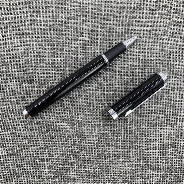 Metal roller pen with cap action