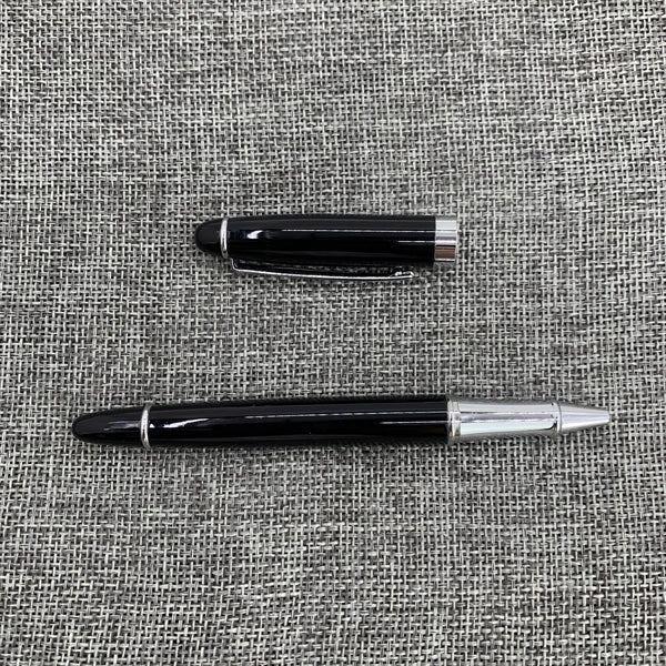 Metal roller pen with cap action