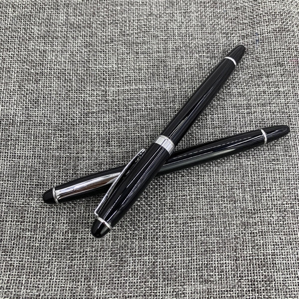 Metal roller pen with cap action